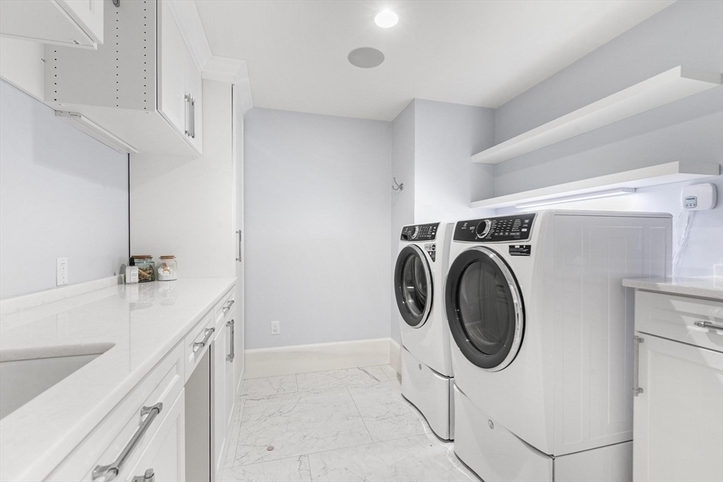 40 Grandview Road Chelmsford, MA 01824 - Photo 23 of 42 a utility room with dryer and washer