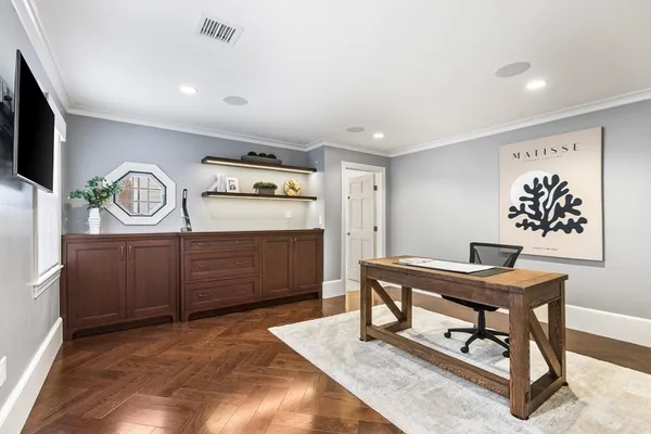 a view of a workspace with furniture