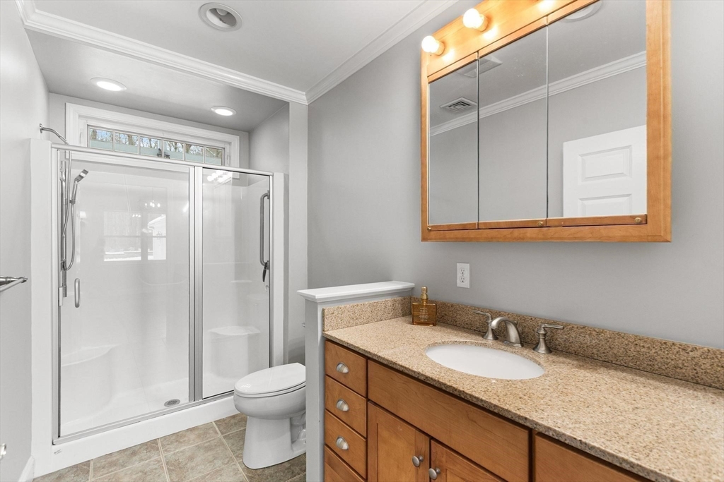 40 Grandview Road Chelmsford, MA 01824 - Photo 35 of 42 a bathroom with a granite countertop sink toilet and shower