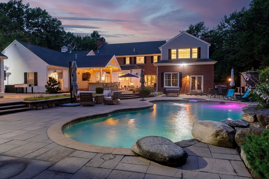 40 Grandview Road Chelmsford, MA 01824 - Photo 41 of 42 a view of a swimming pool with outdoor seating