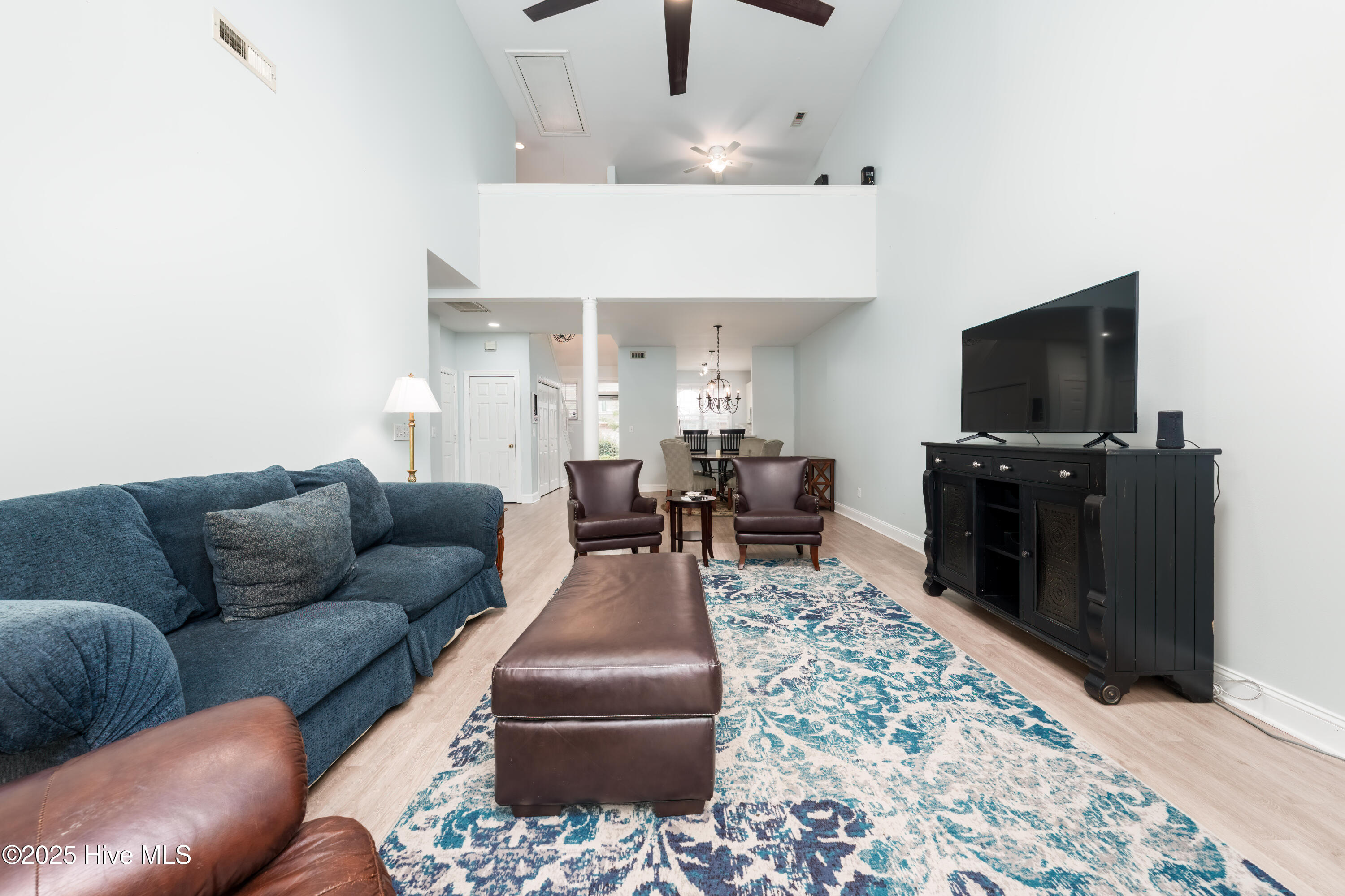 233 Racine Drive, Unit 85 Wilmington, NC 28403 - Photo 10 of 34 Living room looking back toward the front entrance of the home