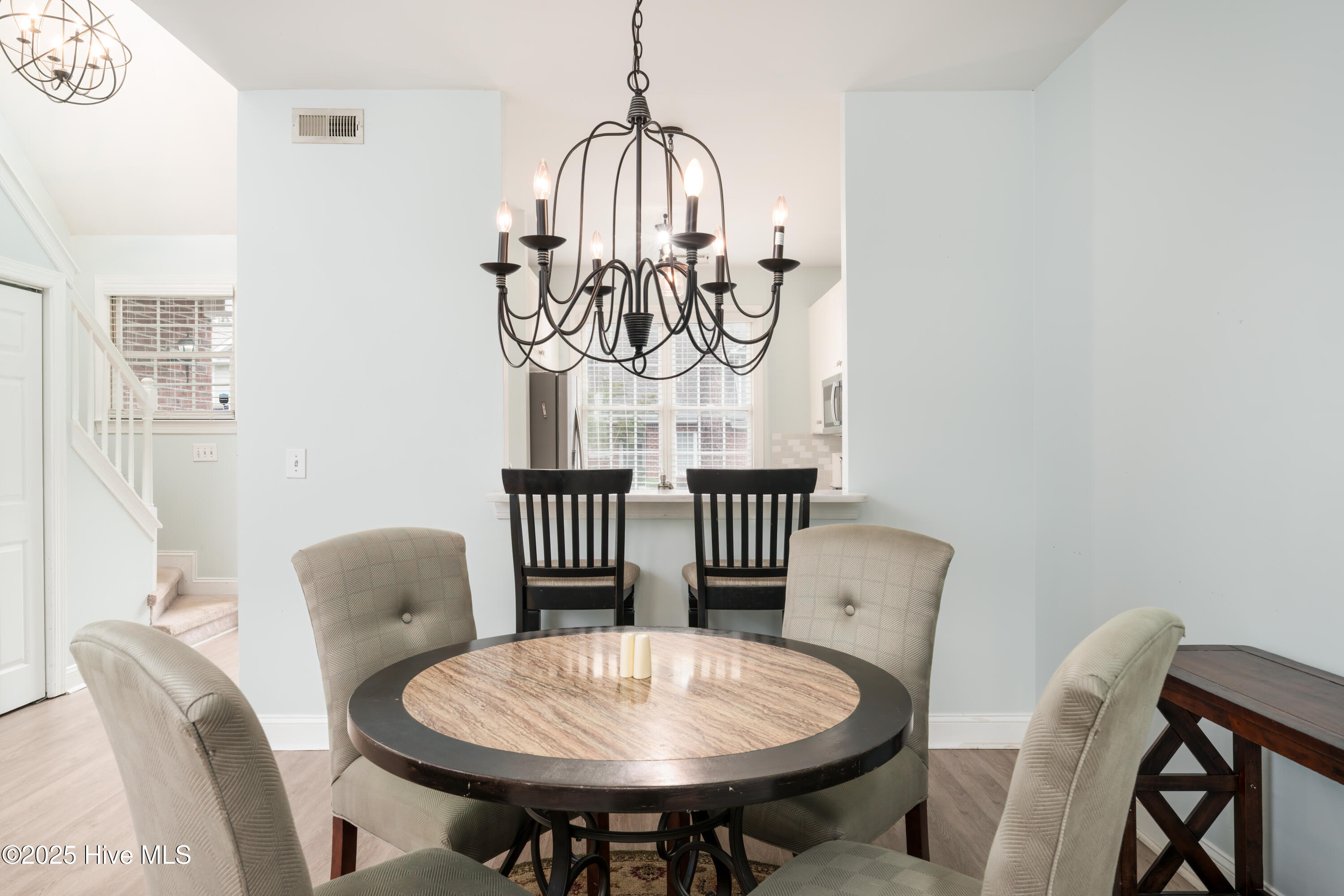 233 Racine Drive, Unit 85 Wilmington, NC 28403 - Photo 17 of 34 Dining Room looking into the Kitchen