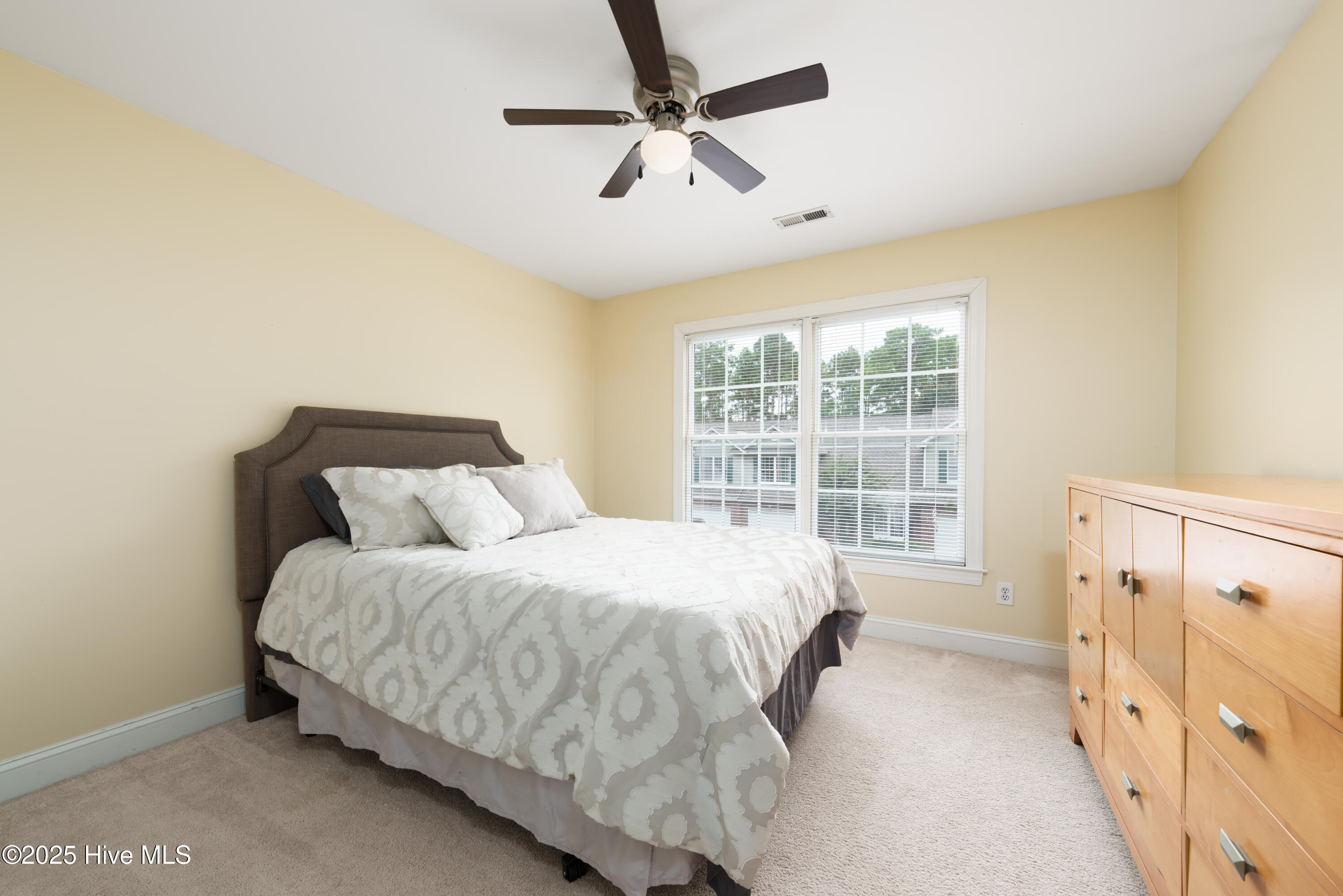233 Racine Drive, Unit 85 Wilmington, NC 28403 - Photo 20 of 34 Upstairs Bedroom on the Front of the Home