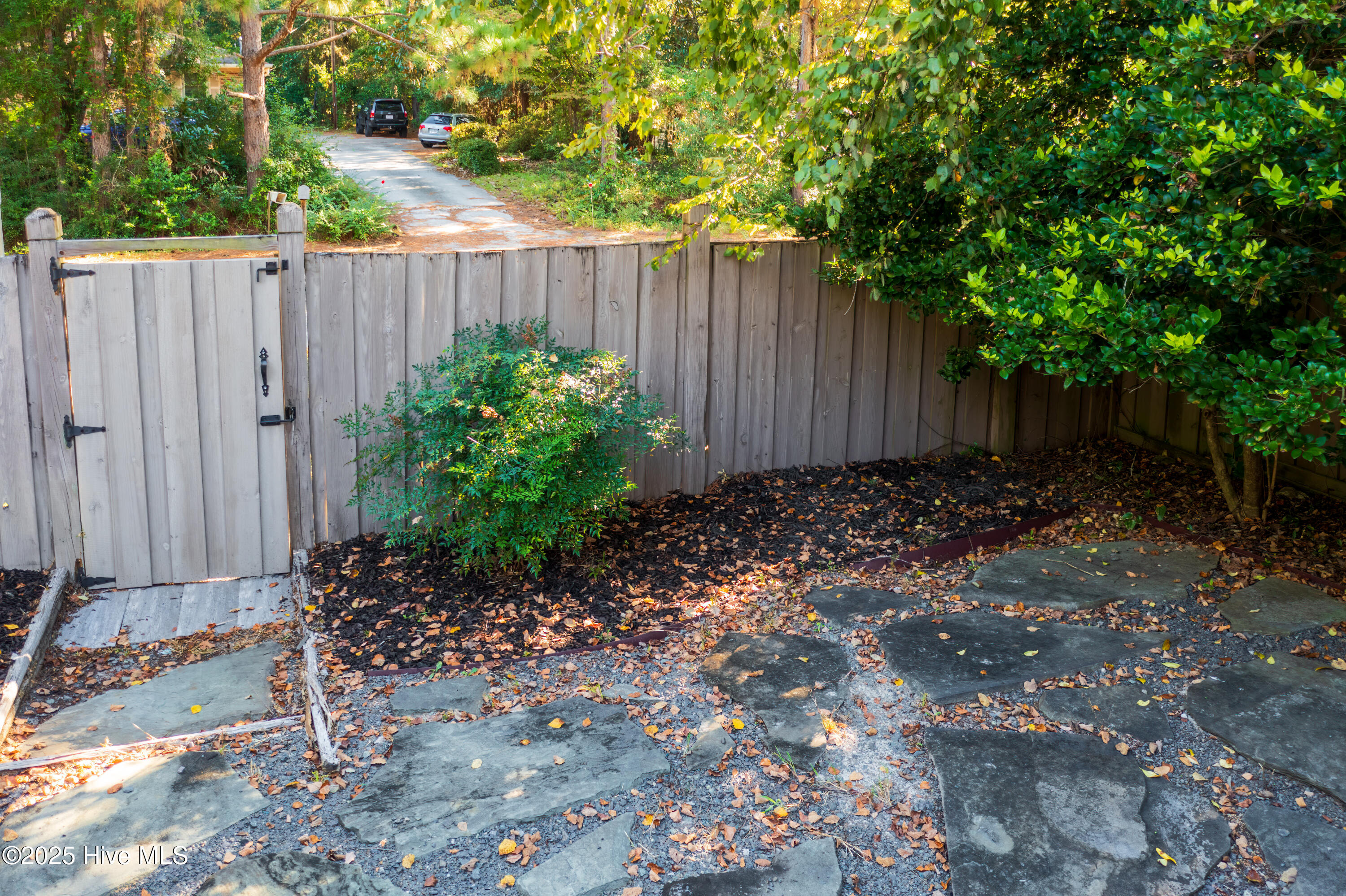 233 Racine Drive, Unit 85 Wilmington, NC 28403 - Photo 25 of 34 Rear gate exiting the Back patio
