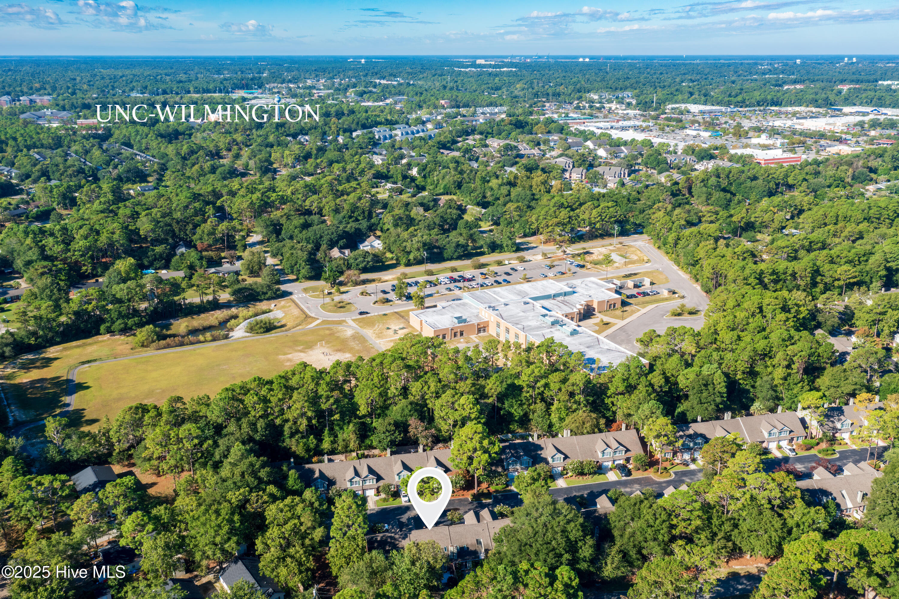 233 Racine Drive, Unit 85 Wilmington, NC 28403 - Photo 26 of 34 Drone Shot with UNCW in the Background