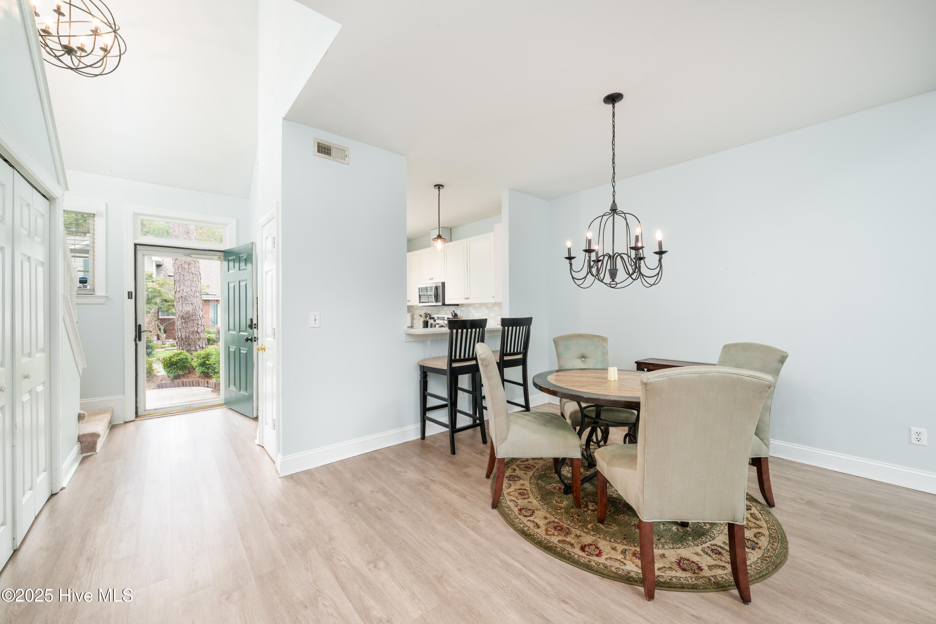 233 Racine Drive, Unit 85 Wilmington, NC 28403 - Photo 6 of 34 Dining area with view of front door