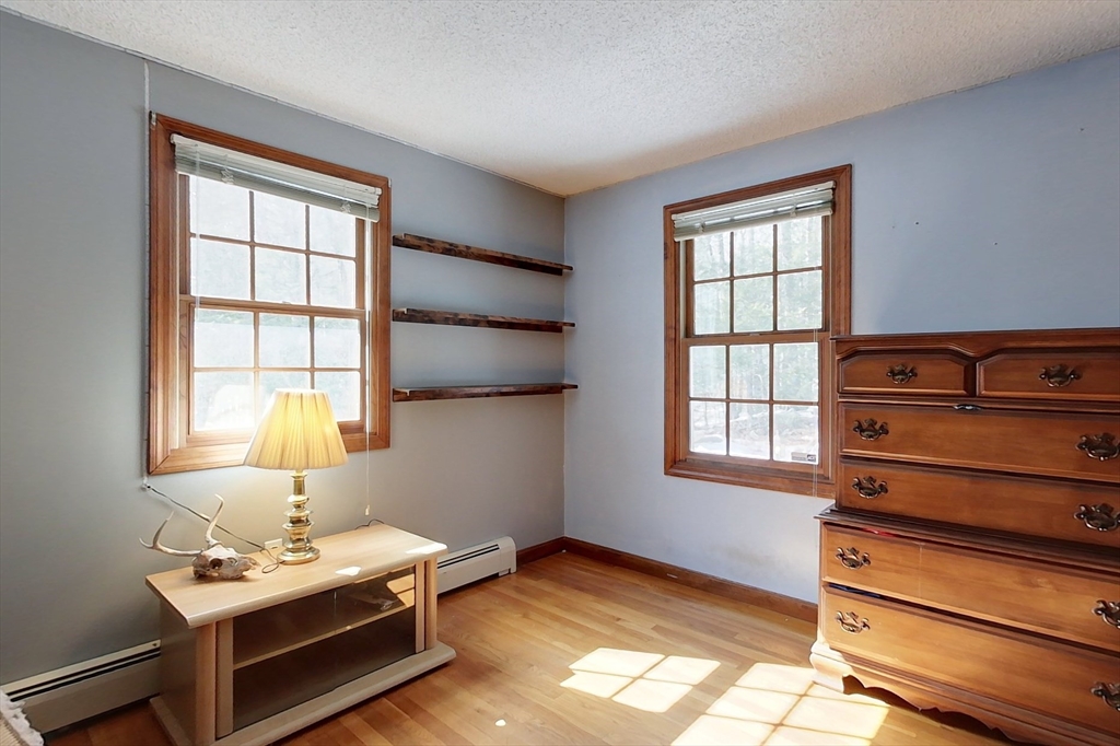 45 Watatic Mountain Road Ashby, MA 01431 - Photo 14 of 31 a bedroom with bed and window