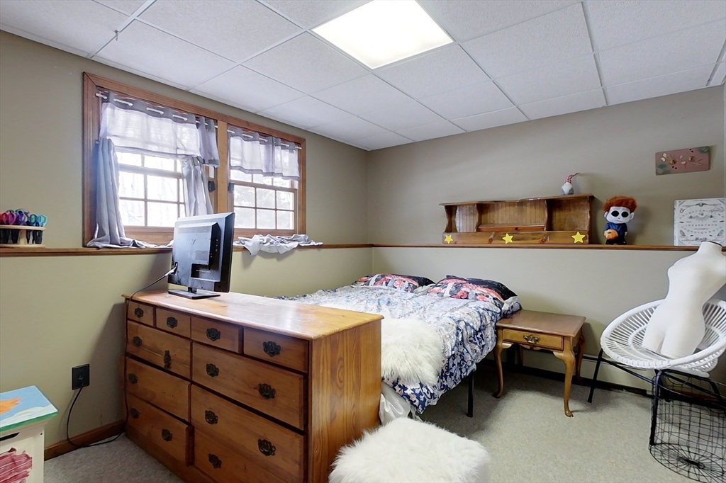 45 Watatic Mountain Road Ashby, MA 01431 - Photo 17 of 31 a bedroom with a bed and a furniture