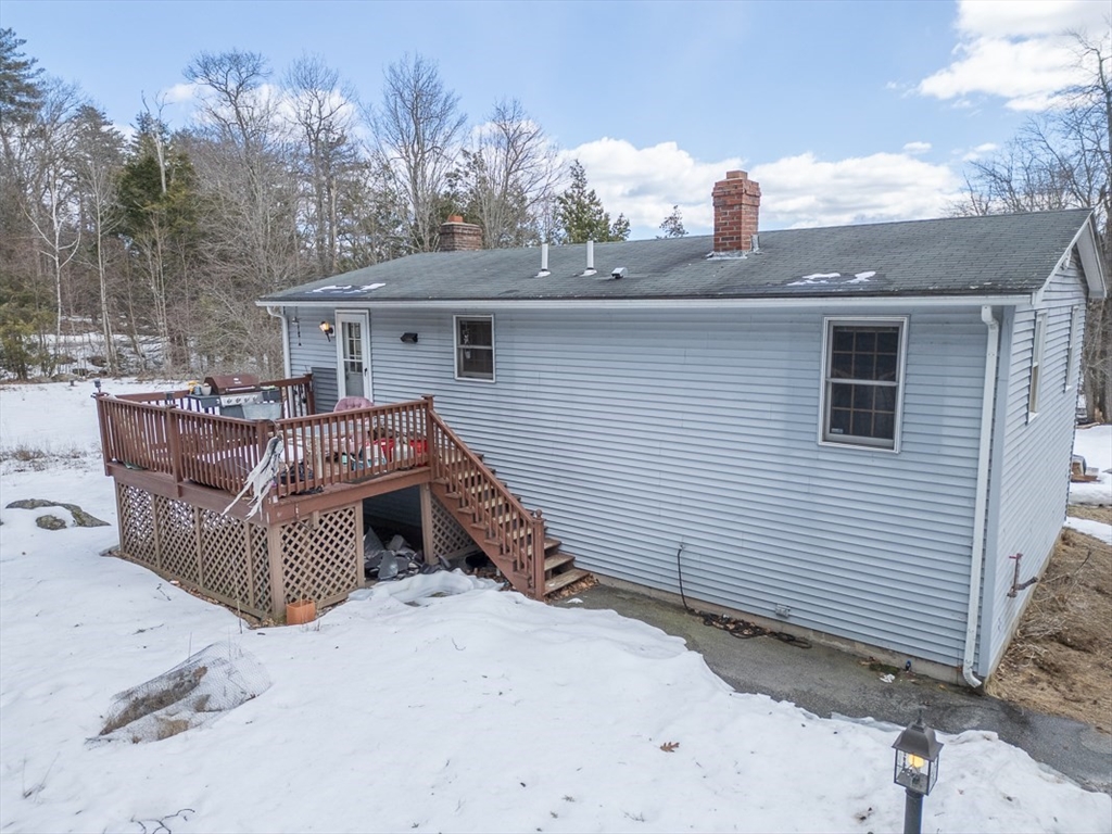 45 Watatic Mountain Road Ashby, MA 01431 - Photo 25 of 31 a view of a house with backyard and sitting area