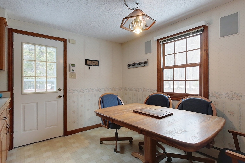 45 Watatic Mountain Road Ashby, MA 01431 - Photo 6 of 31 a view of a dining room with a table and chairs