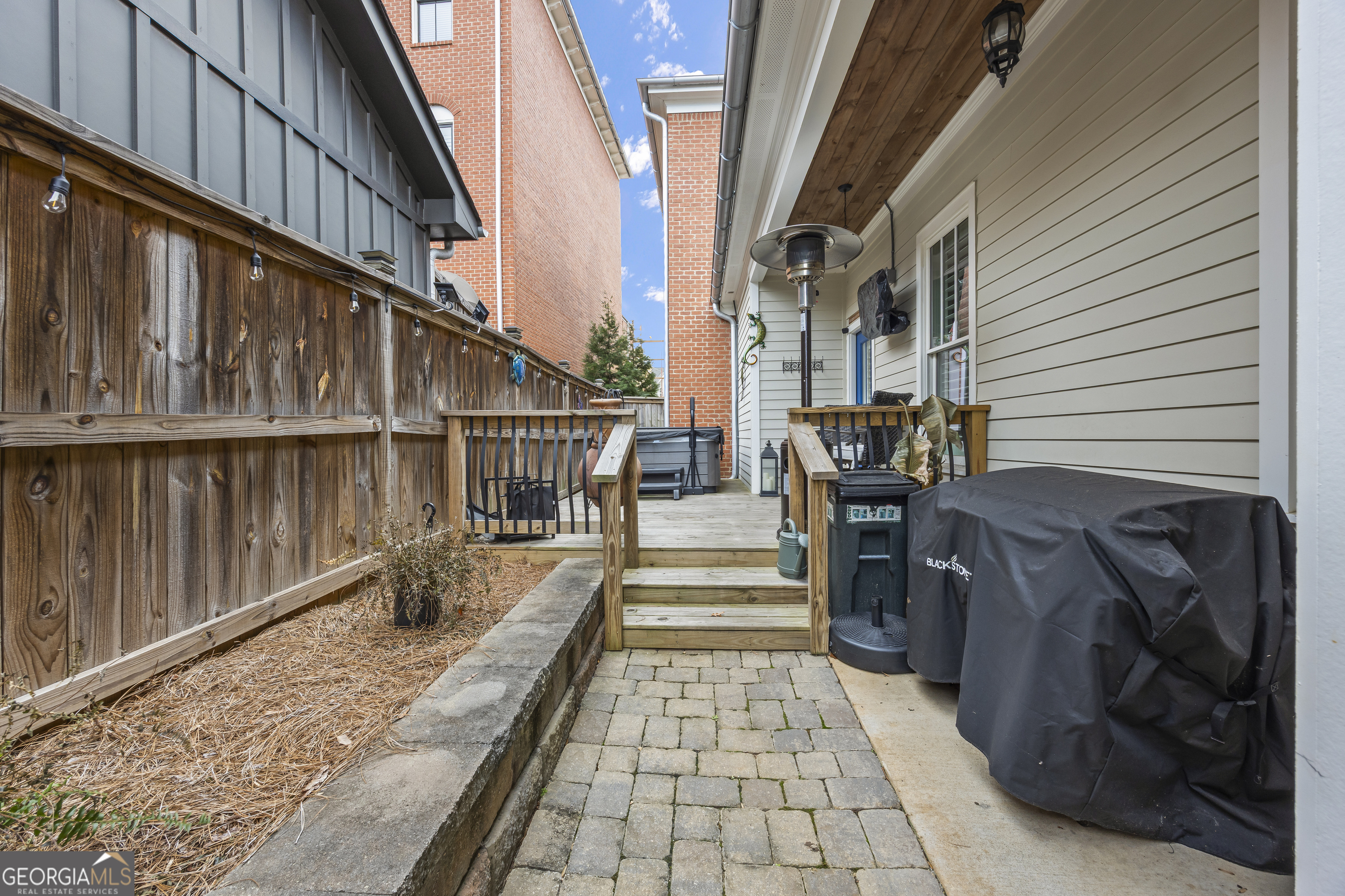 4121 North Swann Street Covington, GA 30014 - Photo 39 of 46 a view of a pathway with an outdoor space