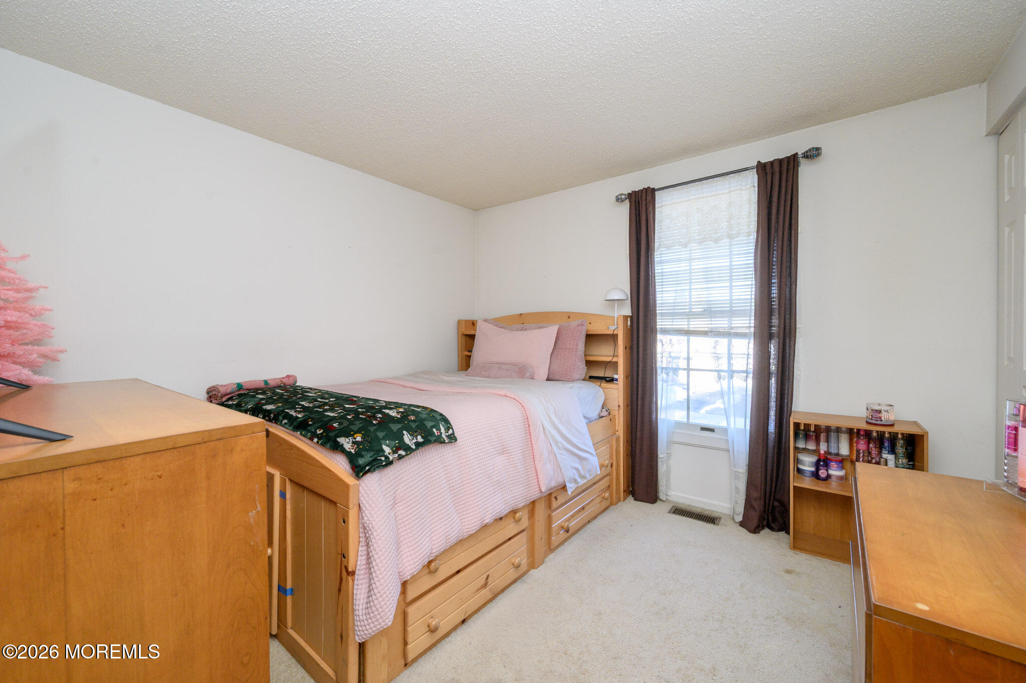 33 Compass Lane Barnegat, NJ 08005 - Photo 13 of 30 a bedroom with a bed and a window