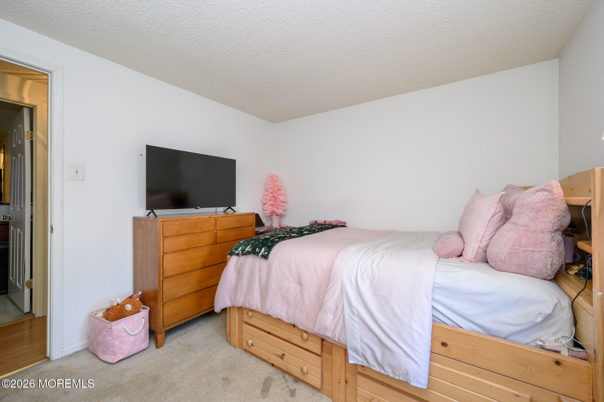 33 Compass Lane Barnegat, NJ 08005 - Photo 14 of 30 a bedroom with a bed and flat screen tv