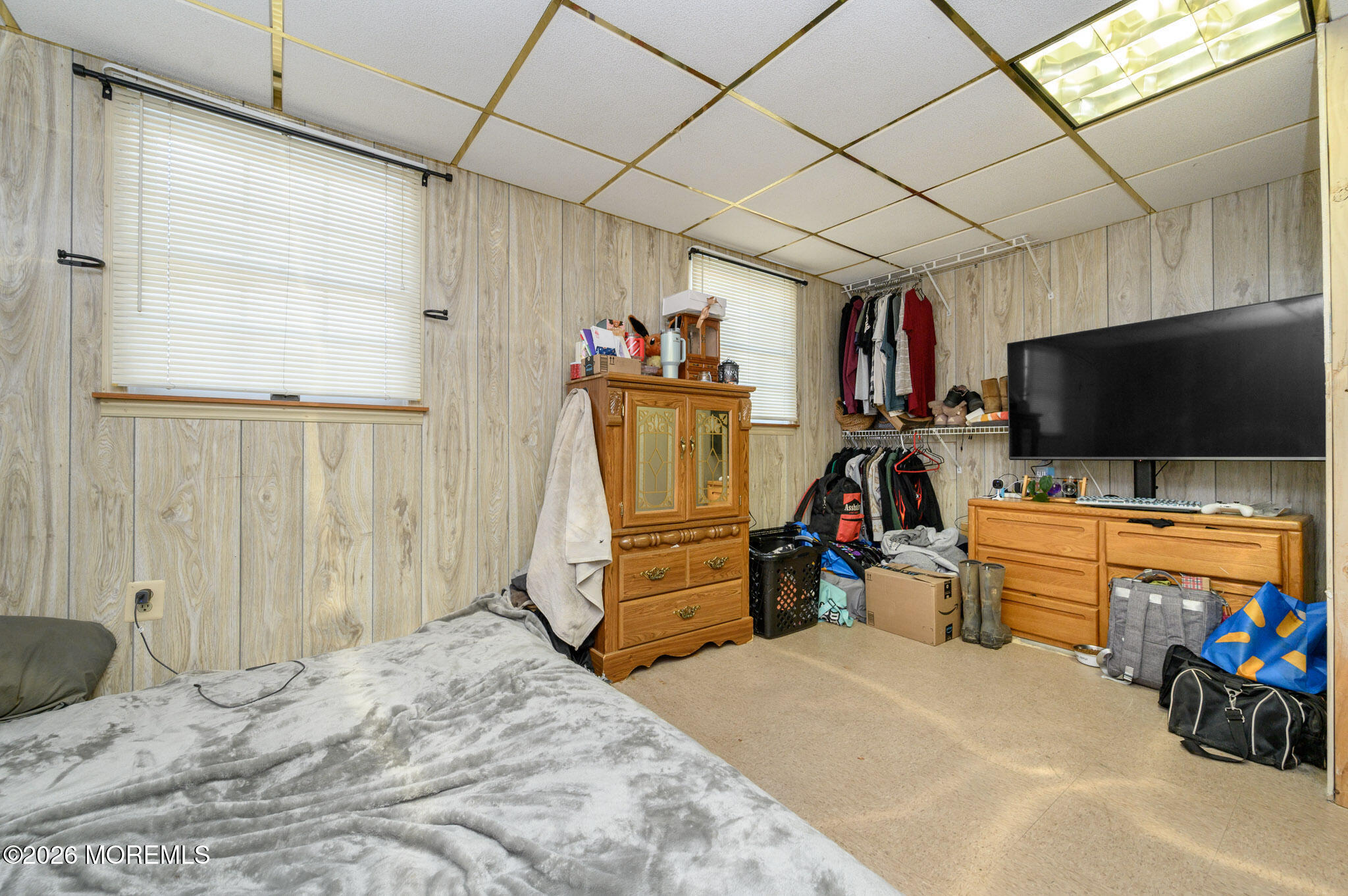 33 Compass Lane Barnegat, NJ 08005 - Photo 22 of 30 a bed room with a bed and a flat screen tv
