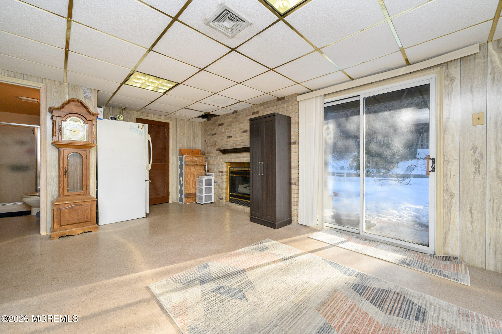 33 Compass Lane Barnegat, NJ 08005 - Photo 25 of 30 a view of a hallway with wooden shelves
