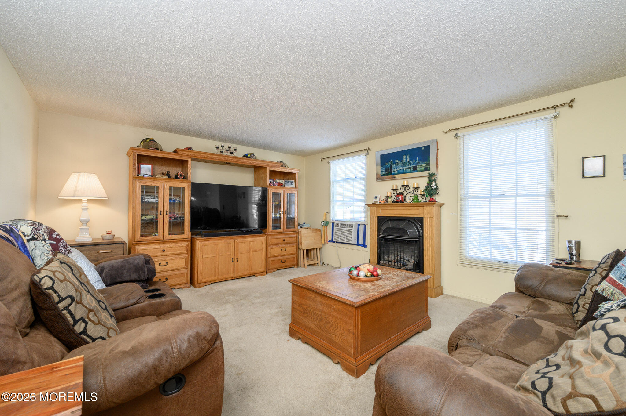 33 Compass Lane Barnegat, NJ 08005 - Photo 4 of 30 a living room with furniture and a flat screen tv