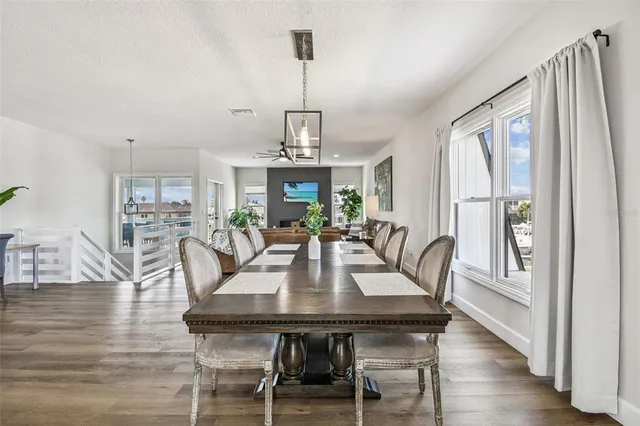 a spacious bedroom with a bed and a couch