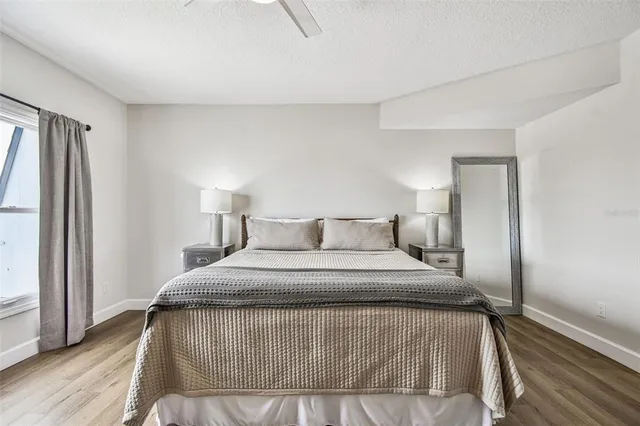 a view of a living room with a wooden floor