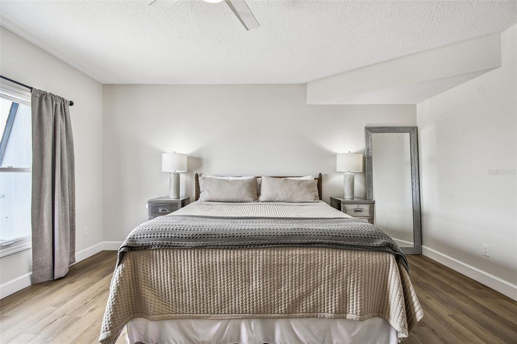 4907 Beacon Road Palmetto, FL 34221 - Photo 25 of 80 a bedroom with a bed and a window