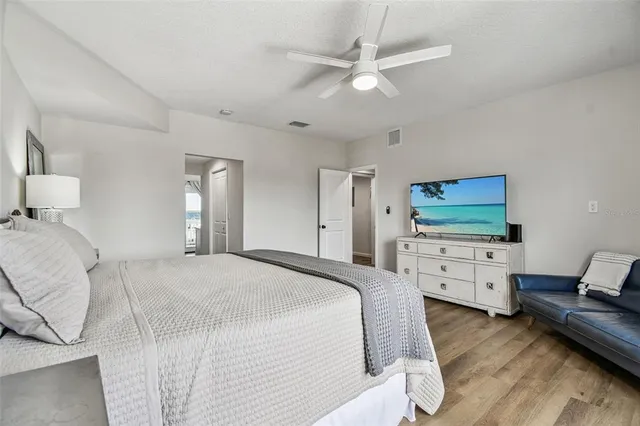 a living room with furniture a window and a table