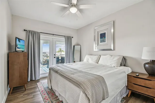 a room with pool table and windows
