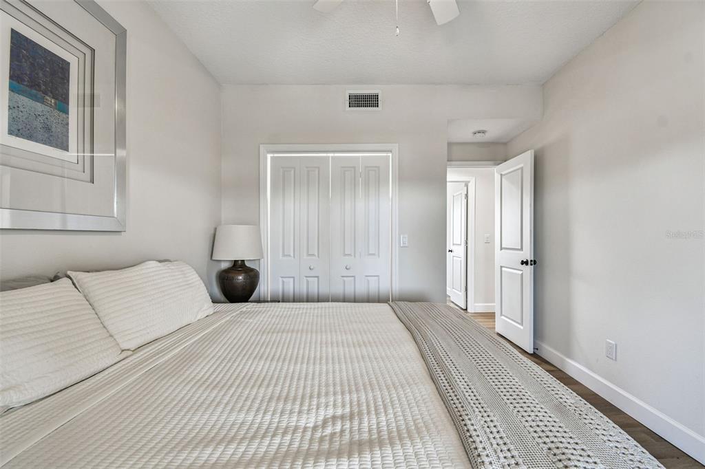 4907 Beacon Road Palmetto, FL 34221 - Photo 32 of 80 a bedroom with a bed and a window