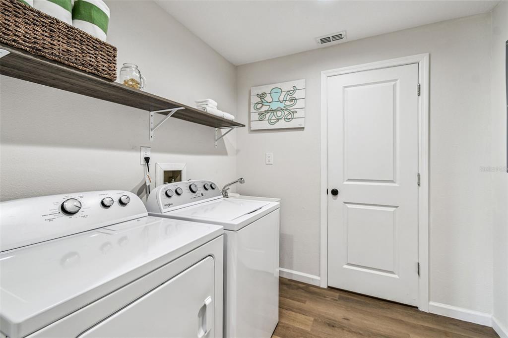 4907 Beacon Road Palmetto, FL 34221 - Photo 37 of 80 a utility room with dryer and washer