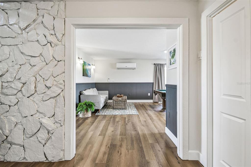 4907 Beacon Road Palmetto, FL 34221 - Photo 38 of 80 a view of a living room with a wooden floor