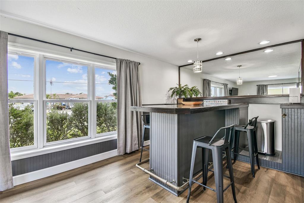 4907 Beacon Road Palmetto, FL 34221 - Photo 42 of 80 a dining room with furniture and a window