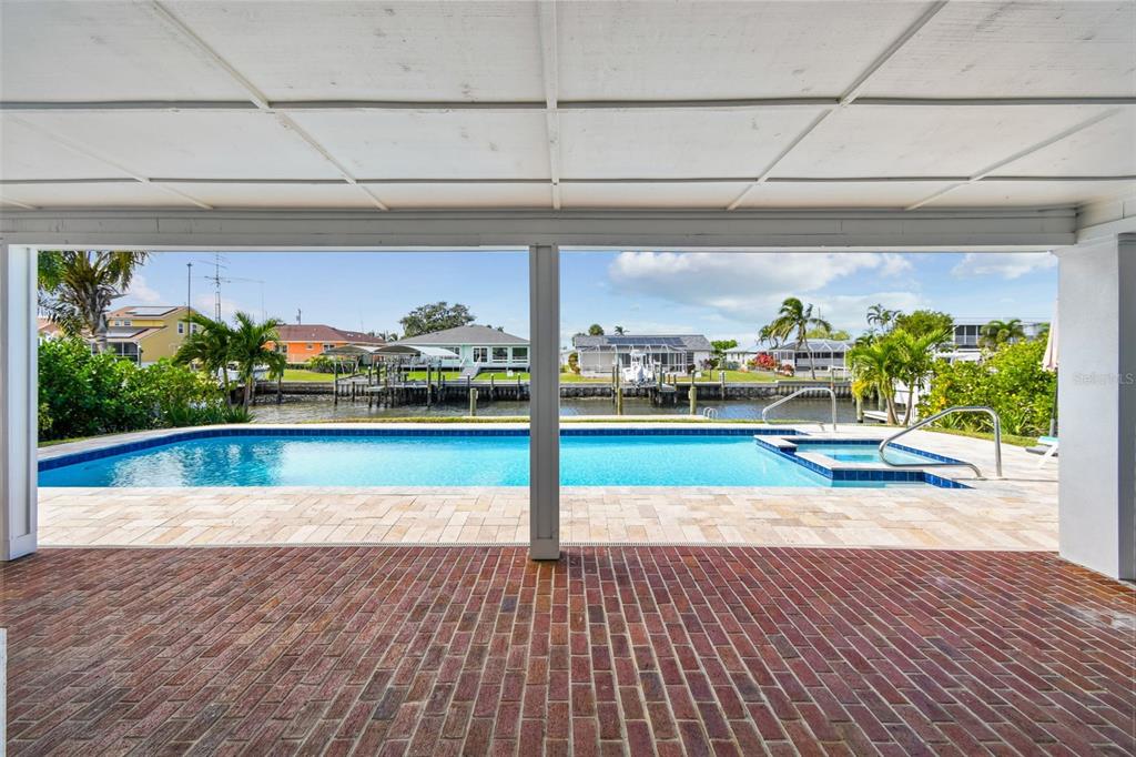 4907 Beacon Road Palmetto, FL 34221 - Photo 48 of 80 a view of swimming pool from a window