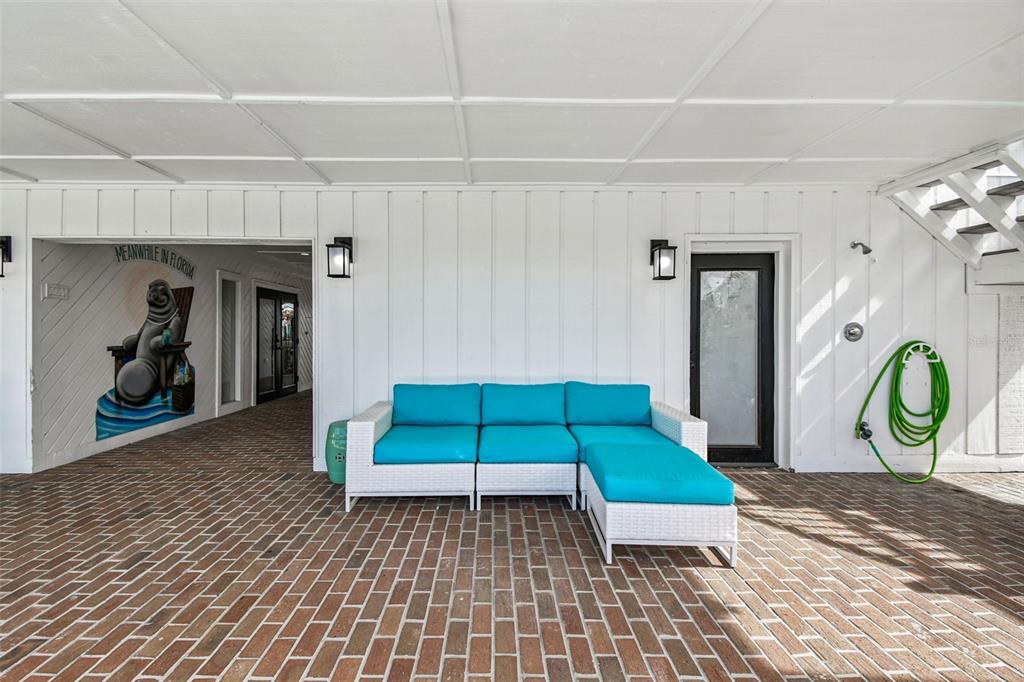 4907 Beacon Road Palmetto, FL 34221 - Photo 49 of 80 a room with pool and furniture