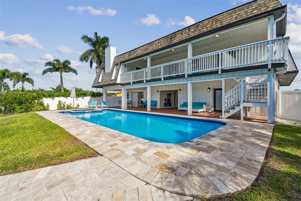 4907 Beacon Road Palmetto, FL 34221 - Photo 57 of 80 a view of an house with swimming pool and sitting area