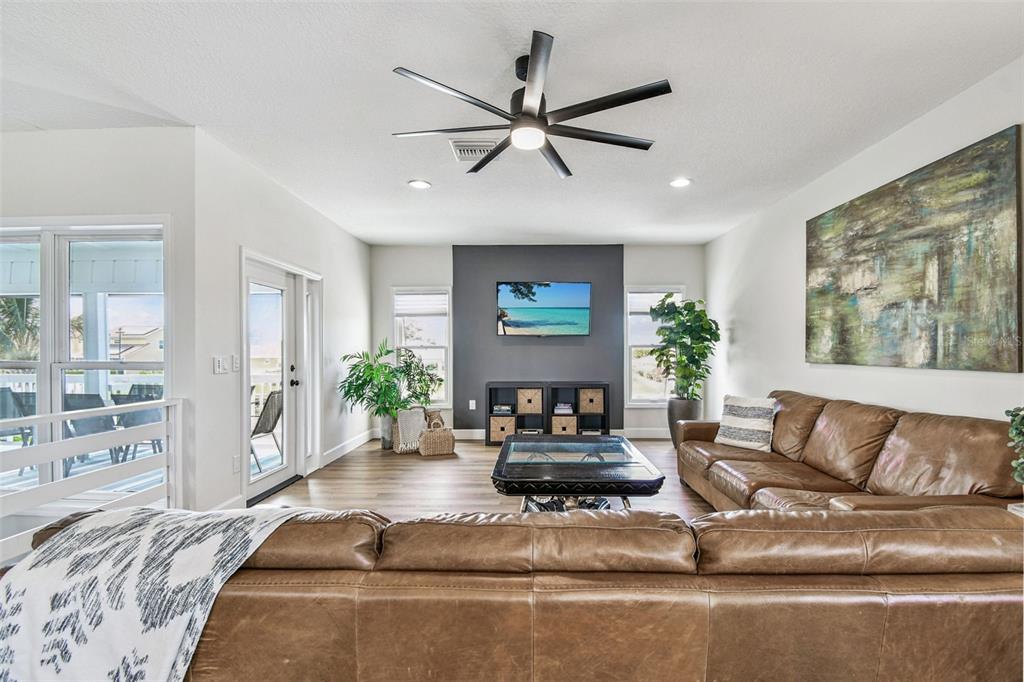 4907 Beacon Road Palmetto, FL 34221 - Photo 8 of 80 a living room with furniture and a large window