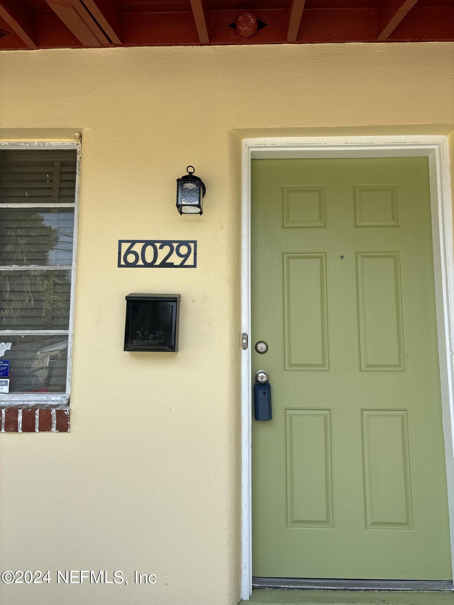 6029 Duke Road Jacksonville, FL 32217 - Photo 4 of 23 a view of a door of the house
