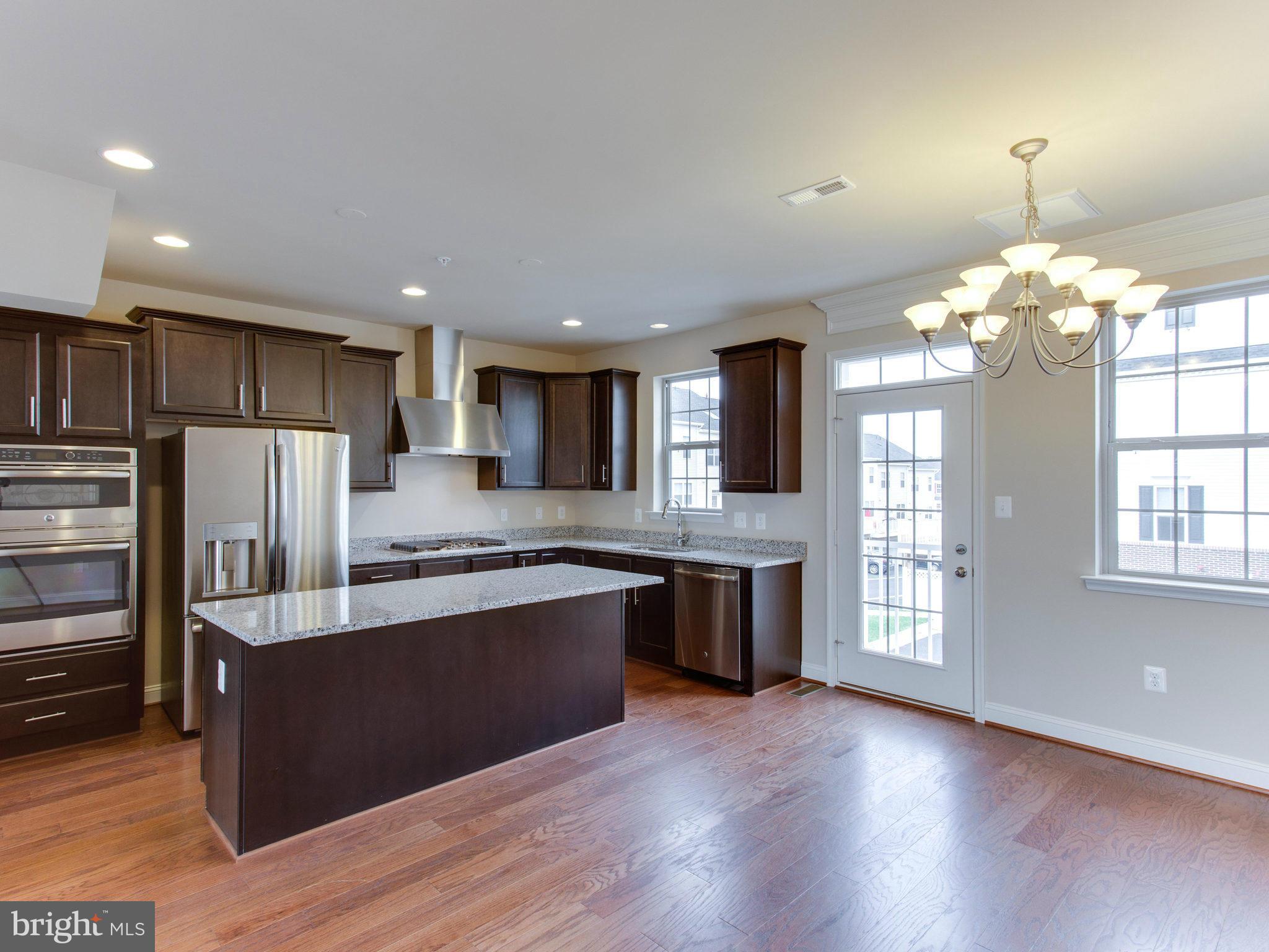 22480 Newcut Road Clarksburg, MD 20871 - Photo 3 of 30 Dining Room to Kitchen