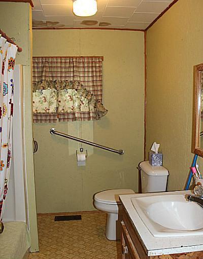 257 Jacob Buck Pond Road Bucksport, ME 04416 - Photo 12 of 15 Facade/Exterior Front. Full bathroom