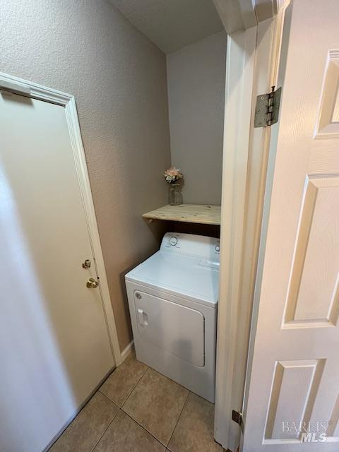 729 Christensen Way Rio Vista, CA 94571 - Photo 16 of 21 a utility room with a washer dryer and white cabinets