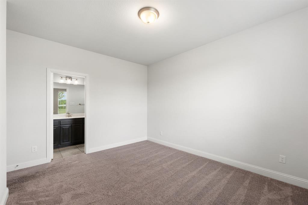 4341 Rush Road Midlothian, TX 76065 - Photo 26 of 39 Bedroom with ensuite bath perfect for family or guests