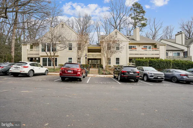 a view of a cars parked in front of a building