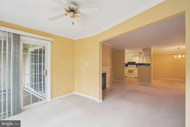 a view of a kitchen with furniture and a kitchen view