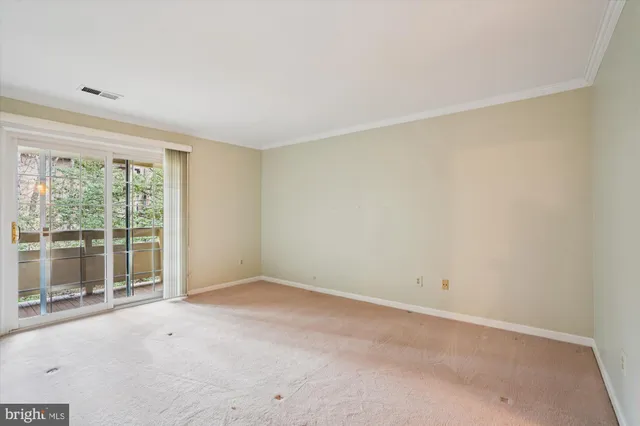 an empty room with window