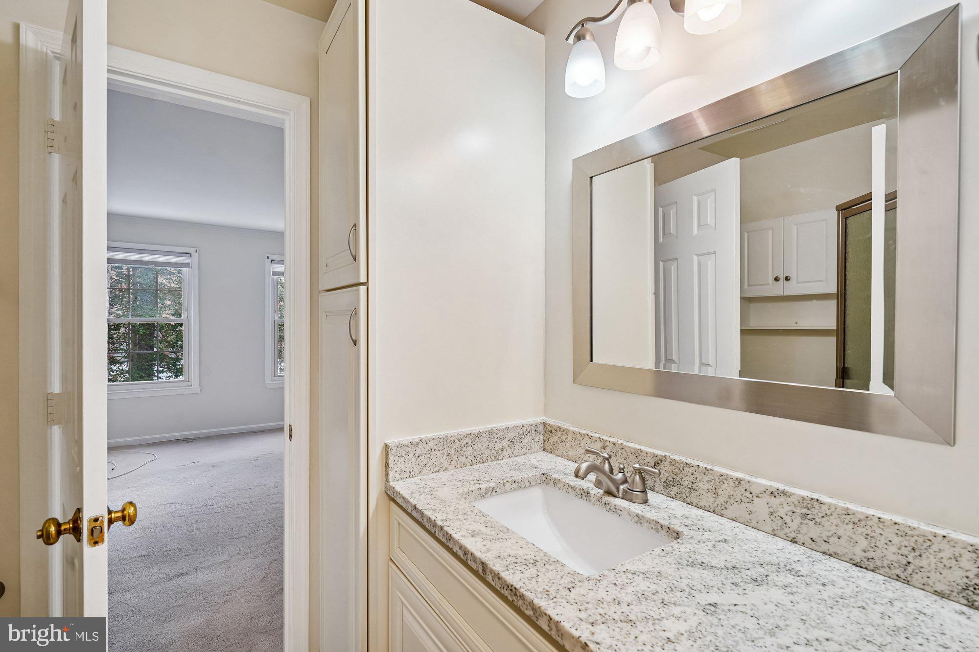 2217 Lovedale Lane, Unit 210A Reston, VA 20191 - Photo 18 of 40 2nd full bath opens to both the hall & 2nd bedroom