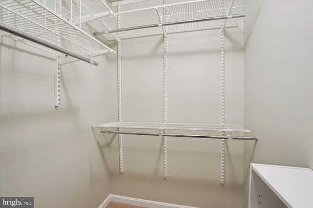 a view of a room with racks on the wall