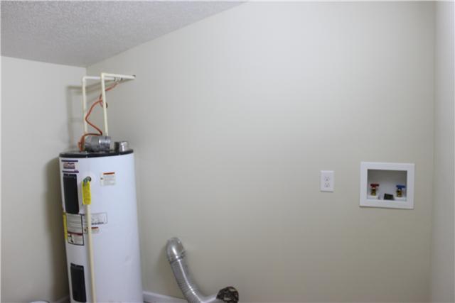 1202 Rutledge Ford Road Decherd, TN 37324 - Photo 11 of 11 a room with a door and a mirror