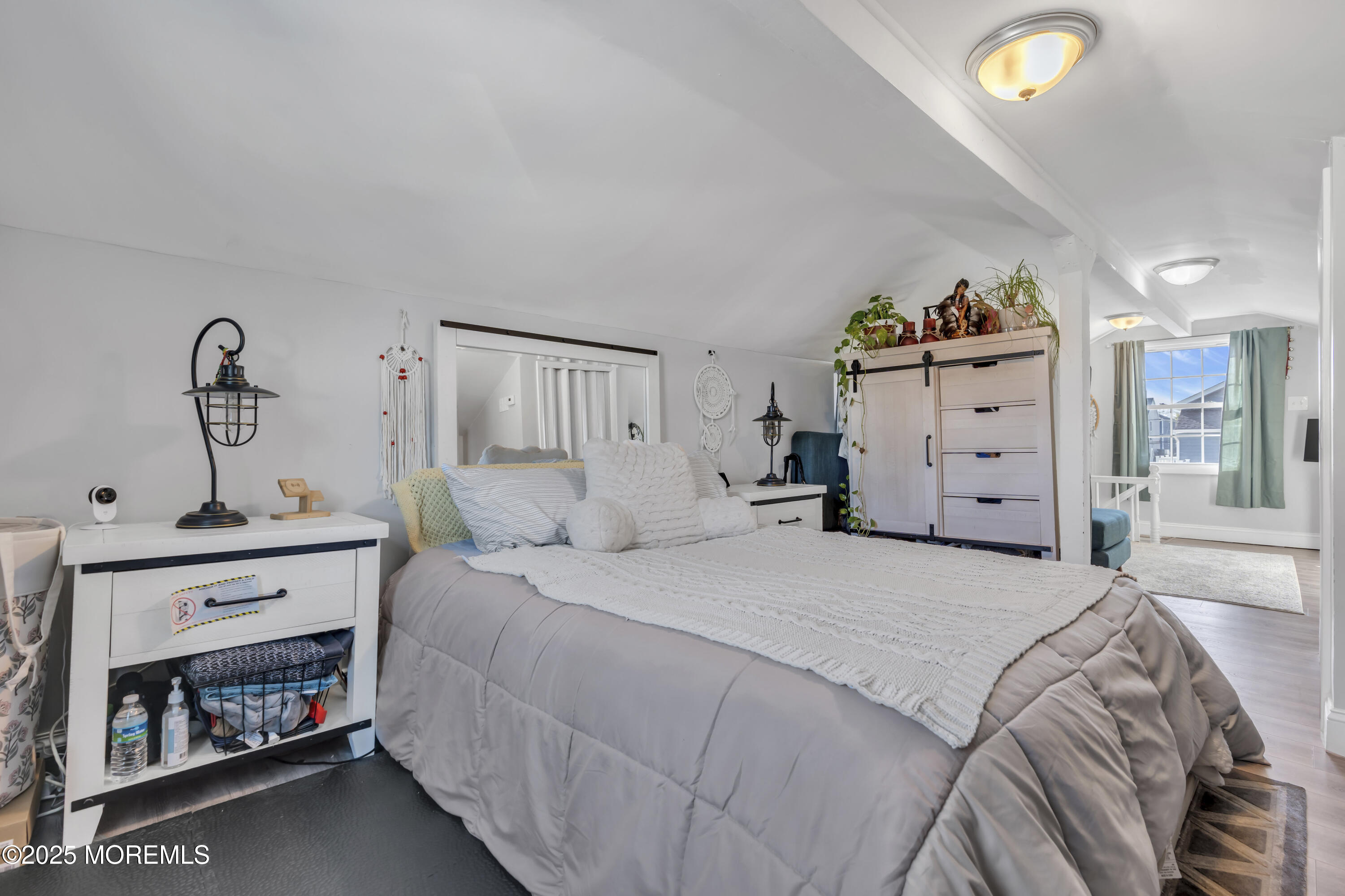 934 7th Street Union Beach, NJ 07735 - Photo 19 of 50 a bedroom with a bed and a dresser