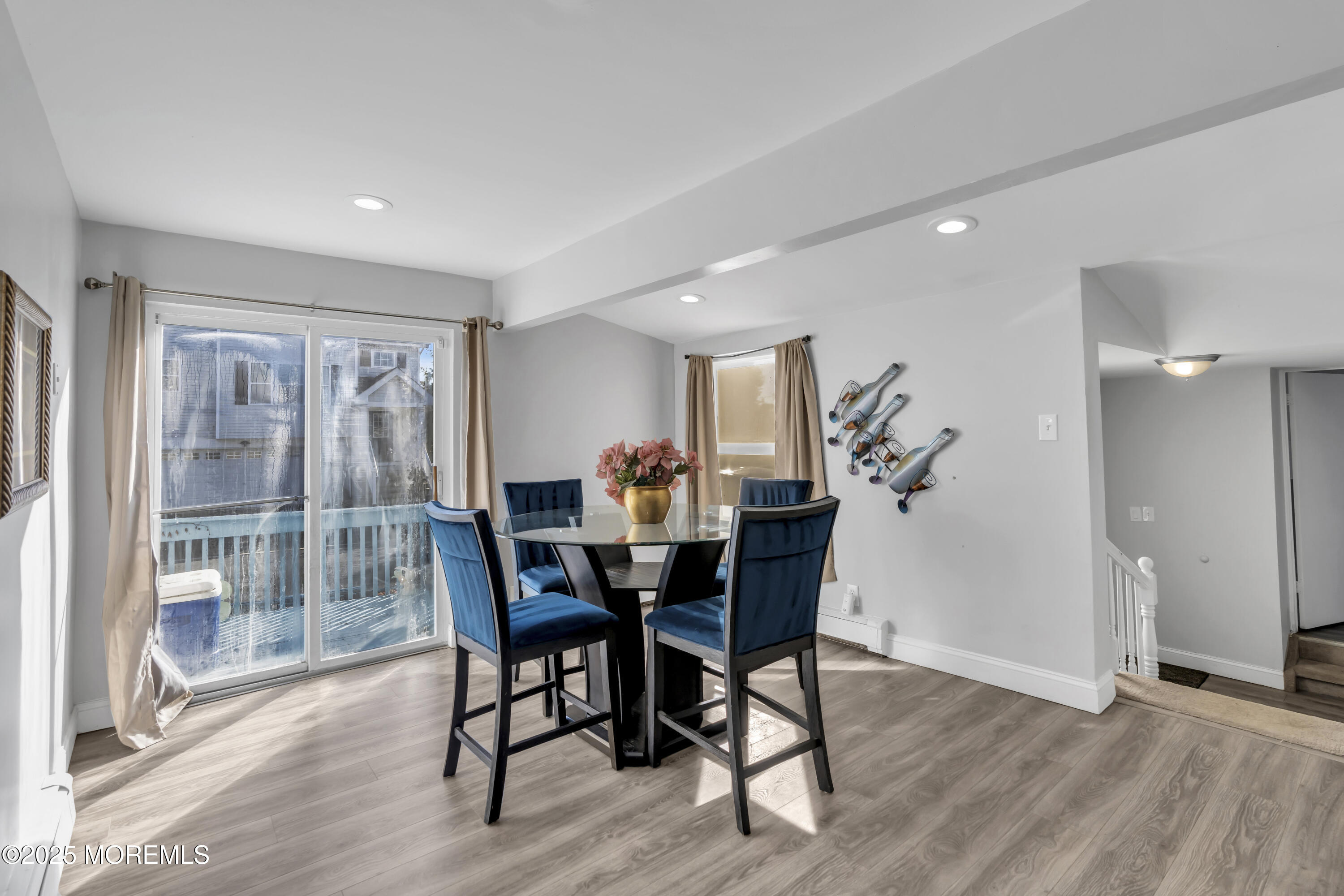 934 7th Street Union Beach, NJ 07735 - Photo 35 of 50 a view of a dining room with furniture window and wooden floor