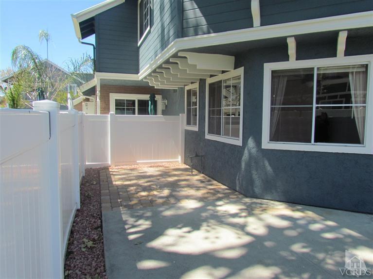1818 Rory Lane, Unit 2 Simi Valley, CA 93063 - Photo 12 of 13 a view of a house with a backyard