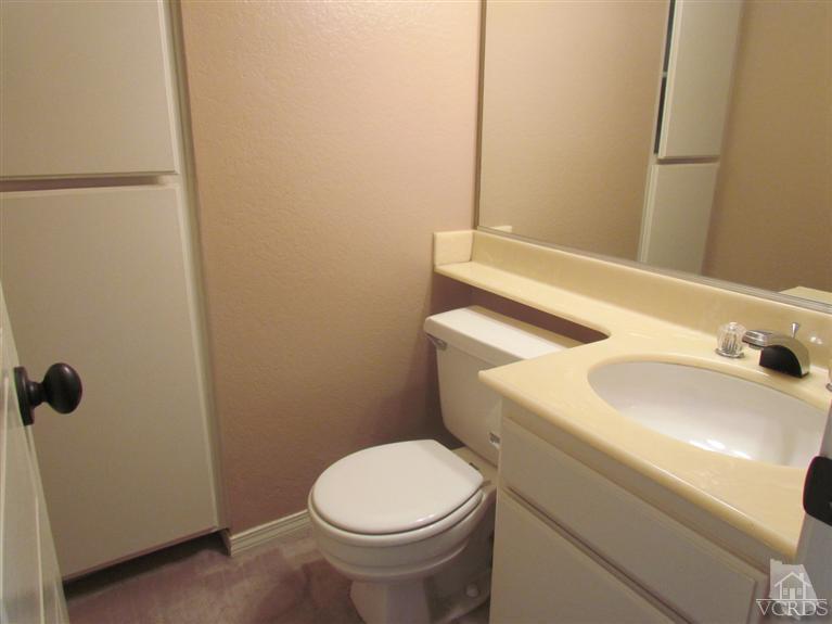 1818 Rory Lane, Unit 2 Simi Valley, CA 93063 - Photo 4 of 13 a bathroom with a sink and toilet