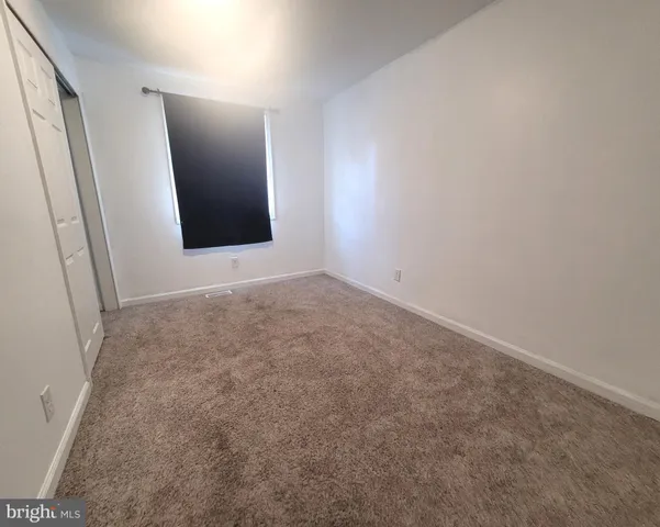 an empty room with window