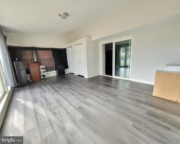 a backyard of a house with seating space